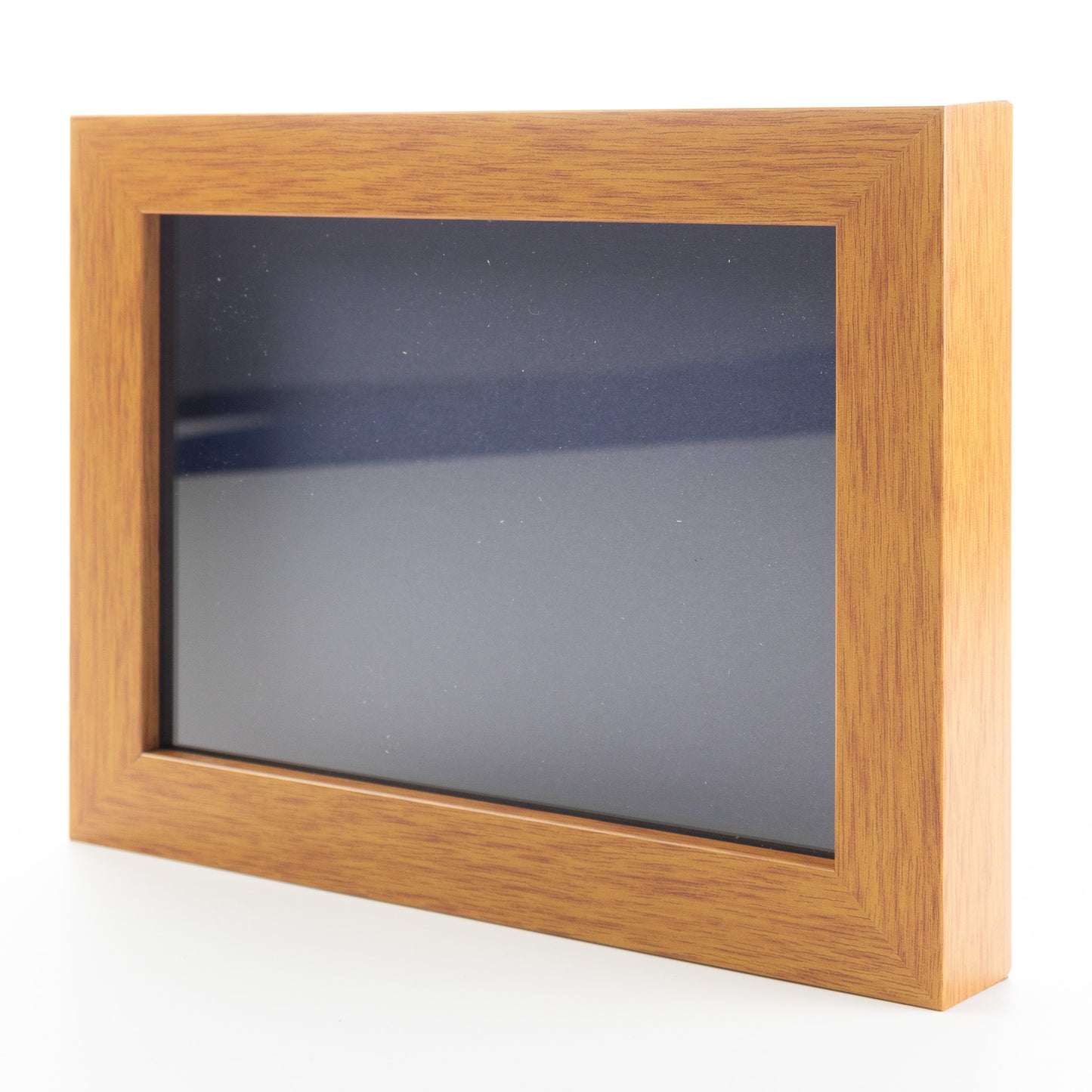 Honey Pecan Wood Shadow Box Display Magazine Frame with Navy Mat - corner and profile view